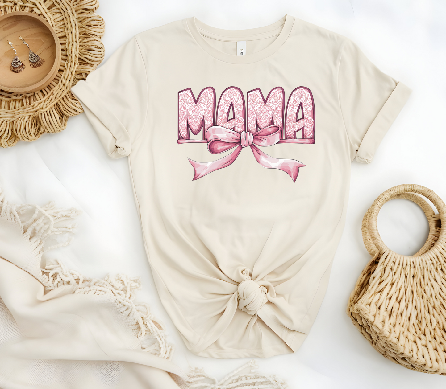 Woman’s T-Shirt featuring the graphic design “Mama in pink with a delicate pattern and a pink coquette bow”