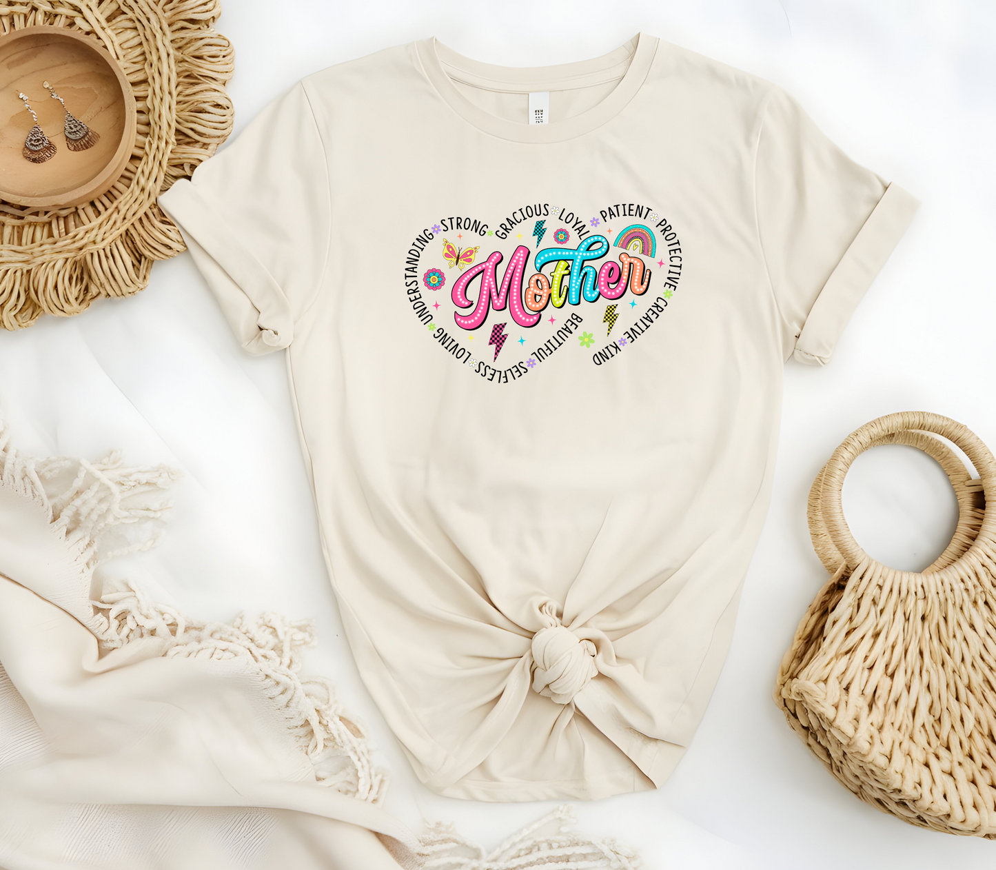 Mothers Day Inspired T-Shirt featuring the message “Mother, surrounded by two hearts and the words, Understanding, Strong, Gracious, Loyal, Loving, Selfless, Beautiful, Patient, Protective, Creative & Kind”