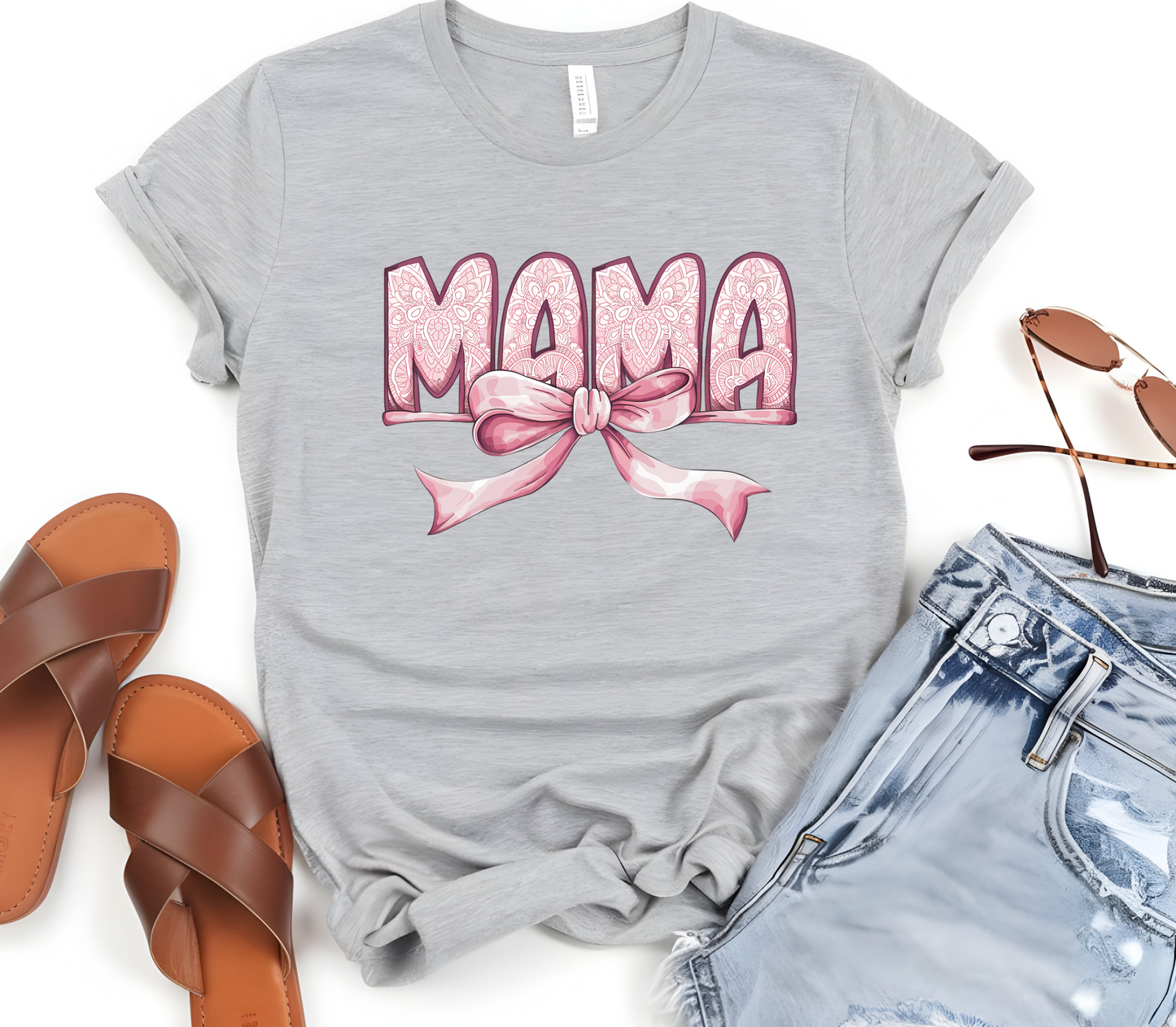 Woman’s T-Shirt featuring the graphic design “Mama in pink with a delicate pattern and a pink coquette bow”