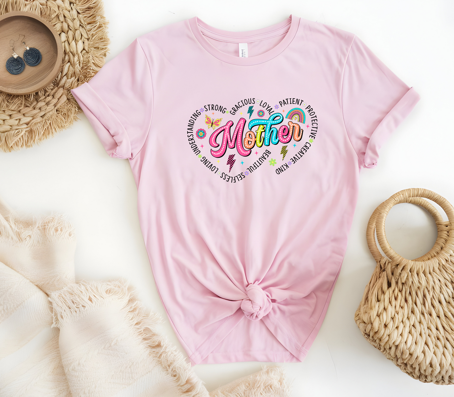 Mothers Day Inspired T-Shirt featuring the message “Mother, surrounded by two hearts and the words, Understanding, Strong, Gracious, Loyal, Loving, Selfless, Beautiful, Patient, Protective, Creative & Kind”