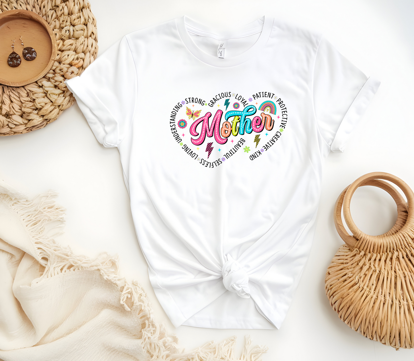 Mothers Day Inspired T-Shirt featuring the message “Mother, surrounded by two hearts and the words, Understanding, Strong, Gracious, Loyal, Loving, Selfless, Beautiful, Patient, Protective, Creative & Kind”