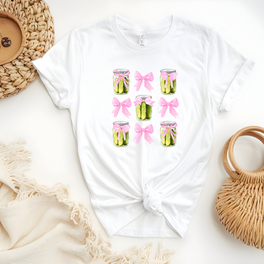 Pickle Inspired Woman’s T-Shirt Featuring Pink Coquette Bows Complete With Tasty Pickles in Mason Jars.