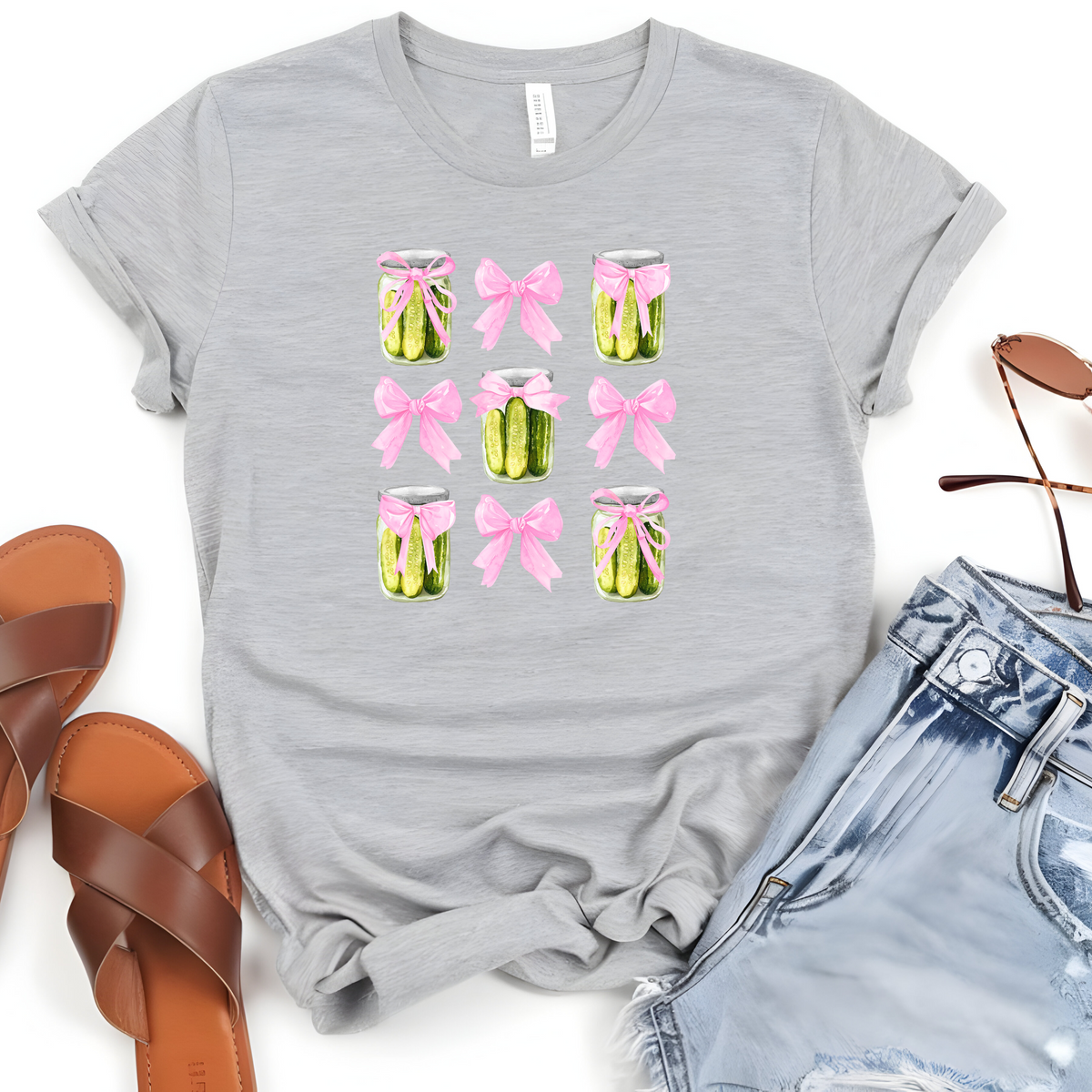Pickle Inspired Woman’s T-Shirt Featuring Pink Coquette Bows Complete With Tasty Pickles in Mason Jars.