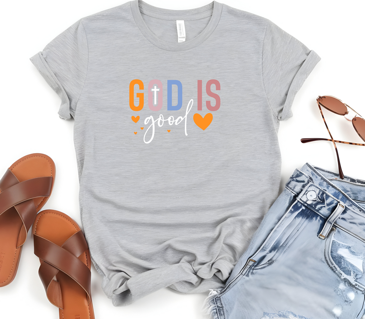 Faith Based Woman’s T-Shirt Featuring The Message “God Is Good”