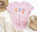 Faith Based Woman’s T-Shirt Featuring The Message “God Is Good”