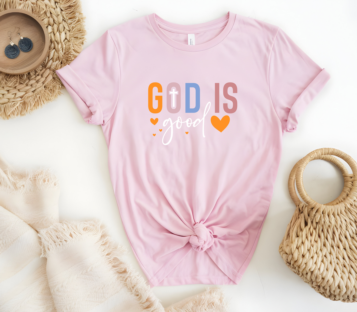 Faith Based Woman’s T-Shirt Featuring The Message “God Is Good”
