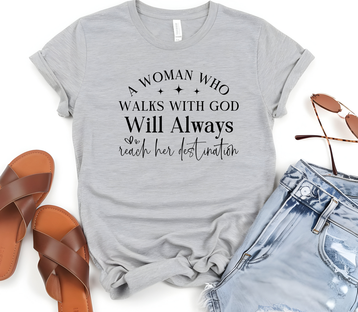 Faith Based Woman’s T-Shirt with the message “A Woman Who Walks with God WILL ALWAYS Reach Her Destination.