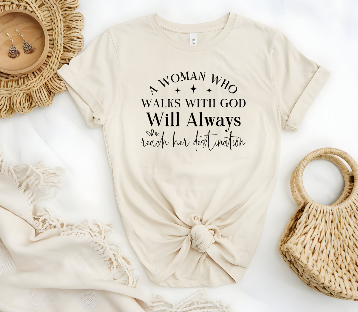 Faith Based Woman’s T-Shirt with the message “A Woman Who Walks with God WILL ALWAYS Reach Her Destination.