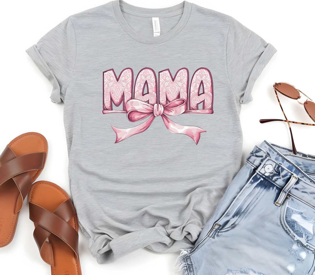 Woman’s T-Shirt featuring the graphic design “Mama in pink with a delicate pattern and a pink coquette bow”