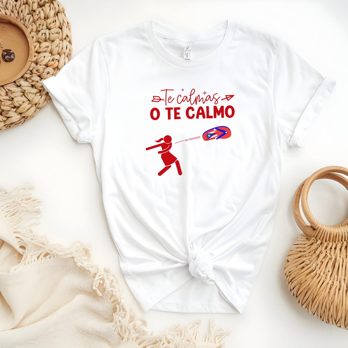 Puerto Rican Chancla Themed Woman’s T-Shirt featuring, a Spanish message “Te Calmas O Te Calmo” with a graphic picture of a mom throwing a flip flop/chancla in Spanish.