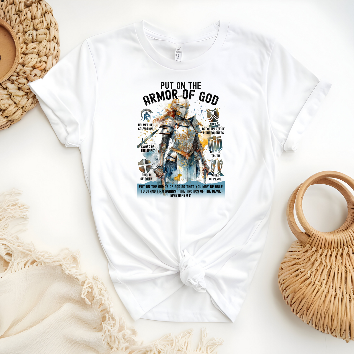 Woman’s Faith Based T-Shirt Featuring the message “Put On The Full Armor Of God, Helmet Of Salvation, Belt of Truth, Sword of Spirit, Breastplate of Righteousness, Shield of Faith & Shoes of Peace”.