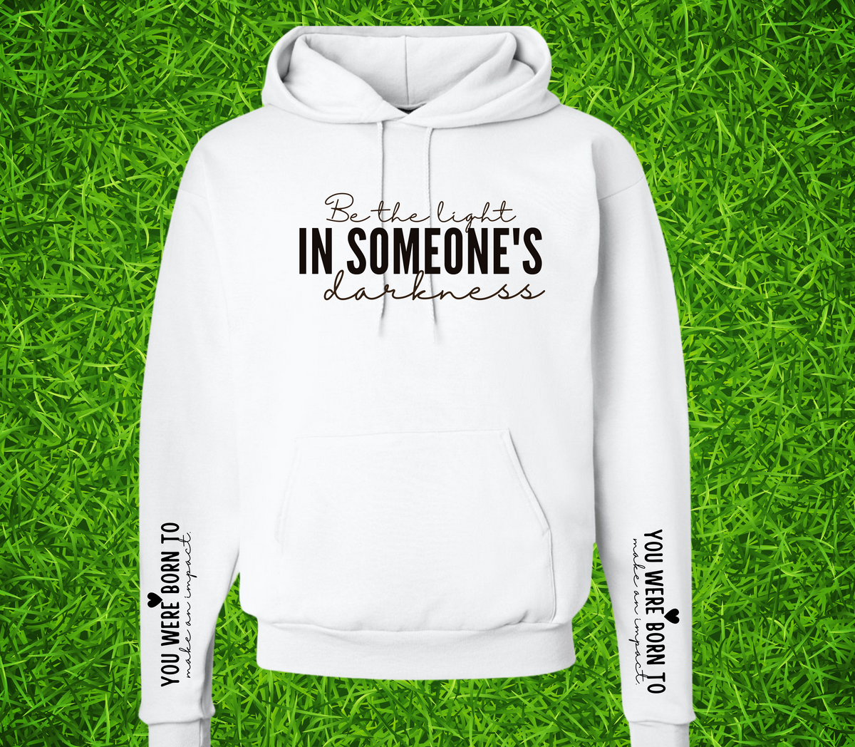 Faith Based Woman’s Hoodie, with the front message, "Be the Light In Someone's Darkness," and the empowering sleeve message, "You Were Born To Make An Impact," (Sleeve print can go on L or R sleeve.)