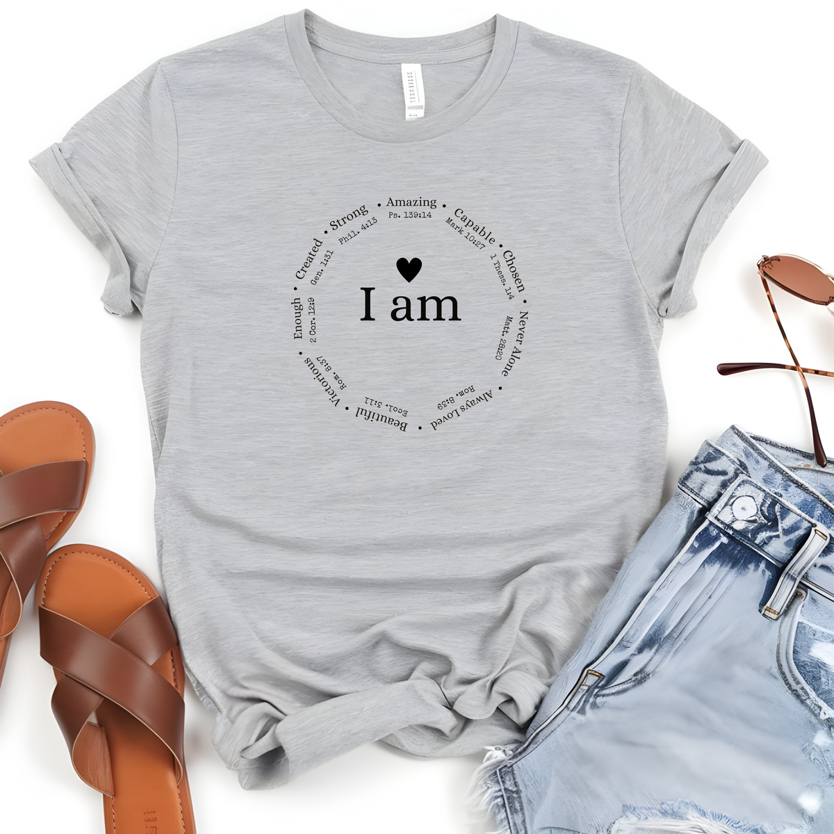 Faith Based T-Shirt featuring the empowering message “I am, strong, amazing, capable, beautiful, victorious, enough, created and never alone”