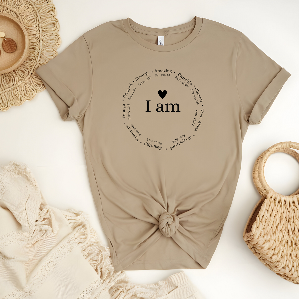 Faith Based T-Shirt featuring the empowering message “I am, strong, amazing, capable, beautiful, victorious, enough, created and never alone”