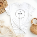 Faith Based T-Shirt featuring the empowering message “I am, strong, amazing, capable, beautiful, victorious, enough, created and never alone”